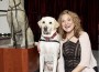 Susan Bahary poses with President George H.W. Bush’s service dog “Sully” and a life-size bronze of his likeness she created for the permanent collection at the George H.W. Bush Presidential Library and Museum in College Station, Texas.